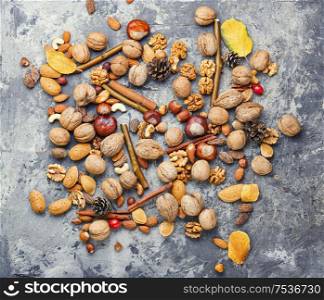 Different types of nuts.Nuts set for healthy diet.Nuts background. Different nuts in a heap
