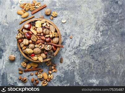 Different types of nuts.Nuts set for healthy diet.Top view with copy space.. Different nuts in a heap