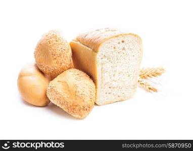 Different types of wheat bread and buns isolated on white. Wheat bread