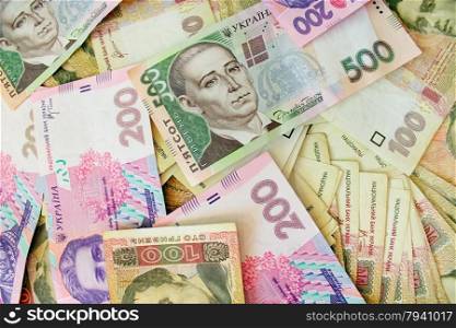 different Ukrainian money in cash. Ukrainian money in cash of different value
