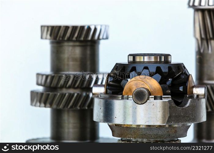 Differential transmission gearbox detailed closeup. Automobile machinery engineeing, industrial objects and details concept.. Differential transmission closeup, machinery engineeing objects