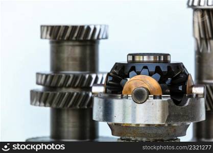 Differential transmission gearbox detailed closeup. Automobile machinery engineeing, industrial objects and details concept.. Differential transmission closeup, machinery engineeing objects