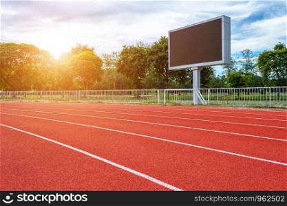 Digital blank scoreboard at football stadium with running track in sport stadium in outdoor ,Advertising Billboard LED, Empty black screen digital.