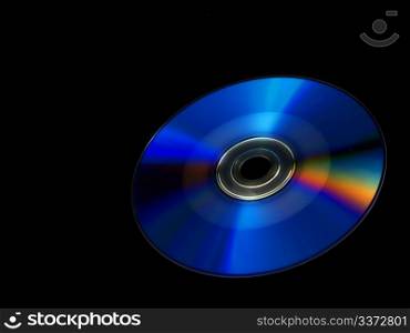 Digital colorful disk isolated towards dark background