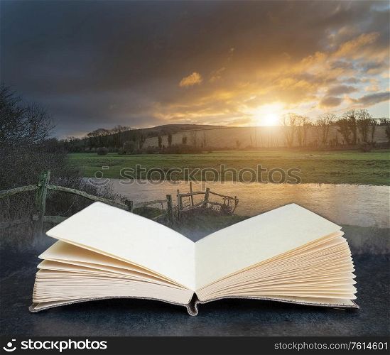 Digital composite concept image of open book wth Stunning Winter sunrise landscape of Cuckmere River winding through South Downs countryside in England