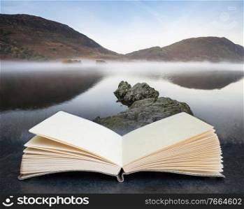 Digital composite of stunning autumn fall landscape image of crummock water at sunrise in lake district england in pages of open book