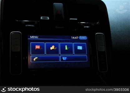 Digital dashboard of a modern car, showing all different functions