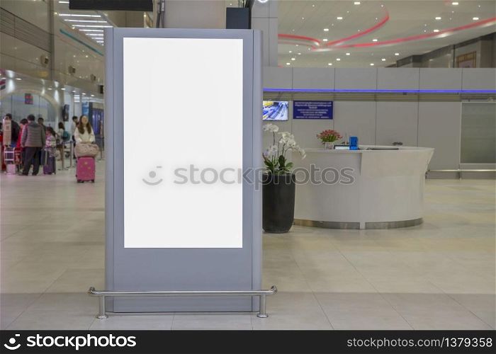 Digital Media Blank billboard in the airport and background blur , signboard for product advertisement design