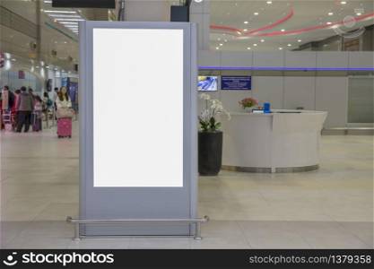 Digital Media Blank billboard in the airport and background blur , signboard for product advertisement design