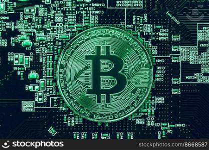 digital money bitcoin cryptocurrency coin on electicity computer computer circuit board color tone.