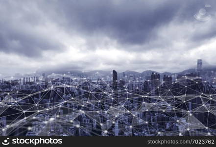 Digital network connection lines of Hong Kong Downtown. Financial district and business centers in smart city in technology concept. Top view of skyscraper and high-rise buildings. Aerial view
