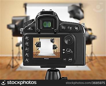 Digital photo camera in studio with softbox and flashes. 3d