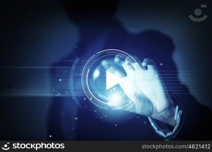 Digital play icon. Businesswoman with media player button in palm