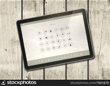 Digital tablet PC with desktop icons on a white wood table - horizontal office mockup. Digital tablet PC on a white wood table
