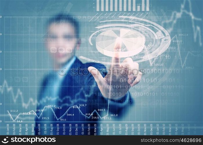 Digital technlogies in use. Portrait of businessman touching virtual panel with finger