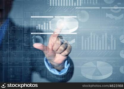 Digital technlogies in use. Portrait of businesswoman touching virtual panel with finger