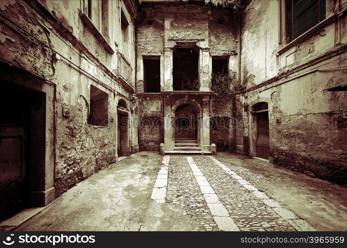 Dilapidated Courtyard of the Old Italian Home in the City of Minori, Vintage Style Toned Picture