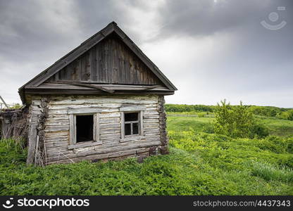 Dilapidated old wooden rustic house in Russia