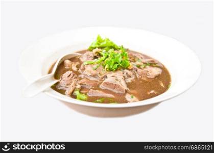 dilicious Thai food call KUAYTEAW MOOTOON from noodle and pork with soup on white background