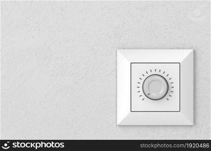 Dimmer light switch on a wall