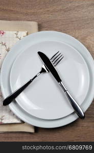 Dining etiquette - I still eat, do not like. Fork and knife signals with location of cutlery set