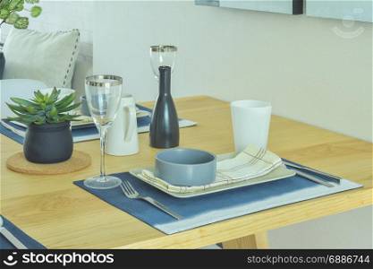 Dining set with pottery style on wooden dining table