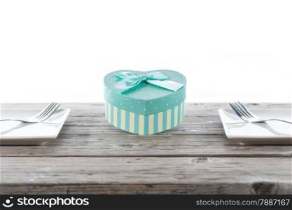 Dining table prepared with a surprise gift