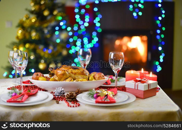 dinner with chicken near Christmas tree