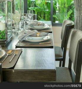 dinning room with table setting on wooden table