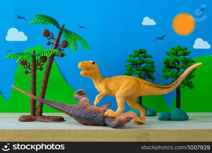 Dinosaur fight scene on wild models background