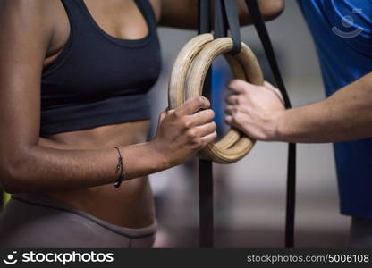 dip ring young man and african american woman relaxed after workout at gym dipping exercise