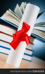 Diploma and stack of books against the background