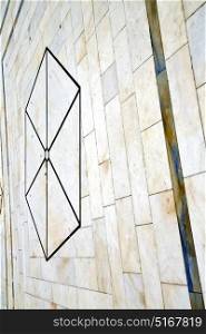 direction sanpietrini busto arsizio street lombardy italy varese abstract pavement of a curch and marble