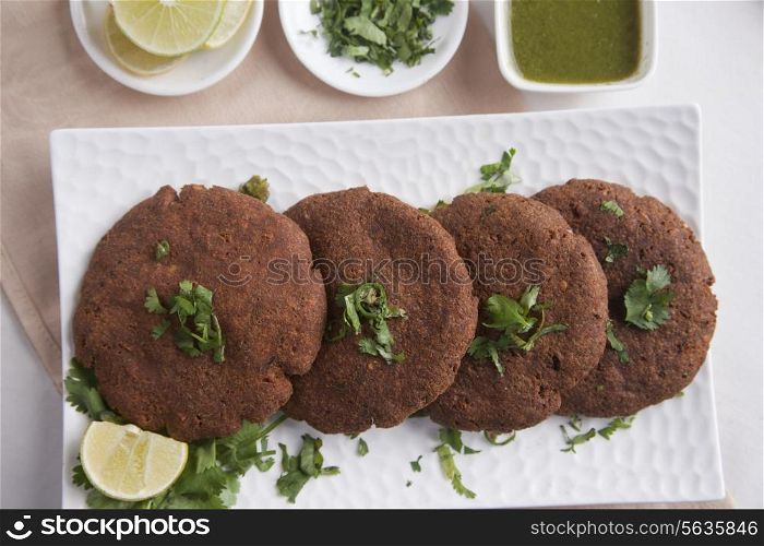 Directly above shot of cutlets arranged in plate