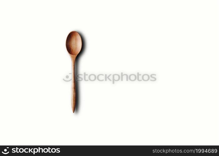Directly Above View Of Wooden Spoon Against White Background