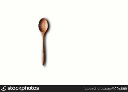 Directly Above View Of Wooden Spoon Against White Background