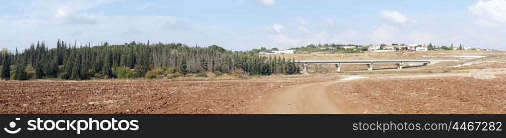 Dirt road and highway in Israel