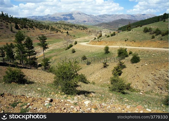 Dirt road and hills in rural area of Turkey