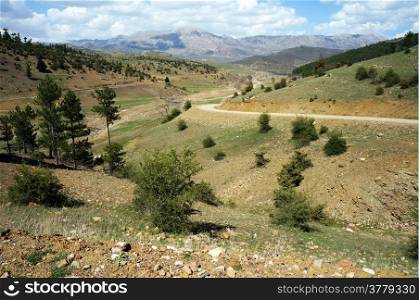 Dirt road and hills in rural area of Turkey