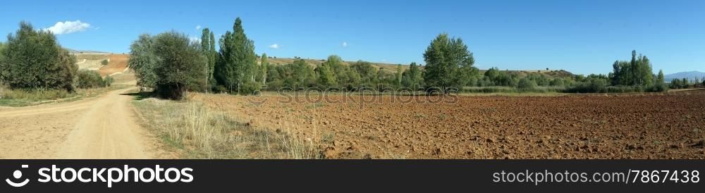 Dirt road and plowed land, Turkey