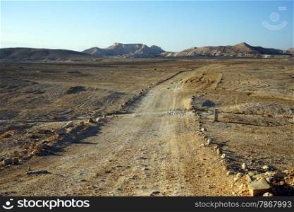Dirt road in Negev desert in Israel