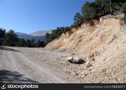 Dirt road near quarry in mountain region of Turkey