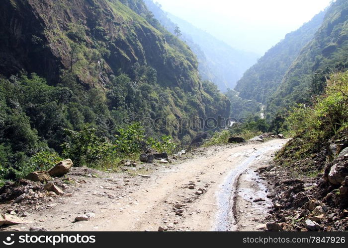 Dirt road near river in mountain in NEpal