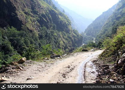 Dirt road near river in mountain in NEpal