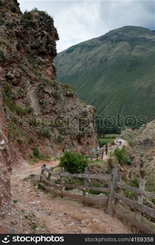 Dirt road passing by a mountain, Sacred Valley, Cusco Region, Peru