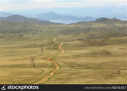 Dirt road to Olkhon island, Lake Baikal, Irkutsk region, Russia.&#xA;