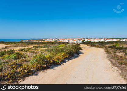 Dirt Road to the Rocky Coast of Atlantic Ocean in Portugal