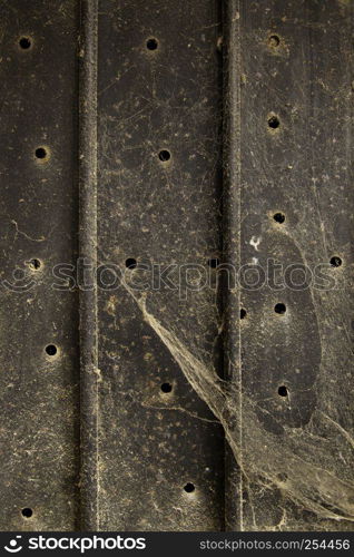 Dirty and abandoned wavy metal background, detail of a textured background, dirt and ruin