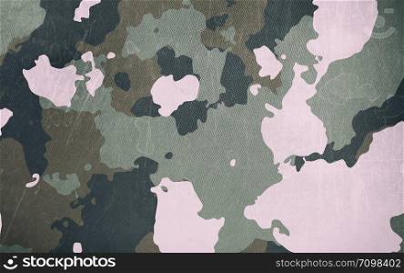 Dirty camouflage fabric texture background. Dirty camouflage fabric texture for background