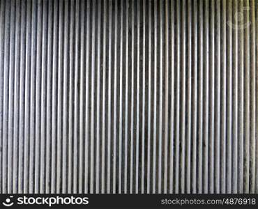 Dirty steel ribs of an escalator structure &#xA;&#xA;